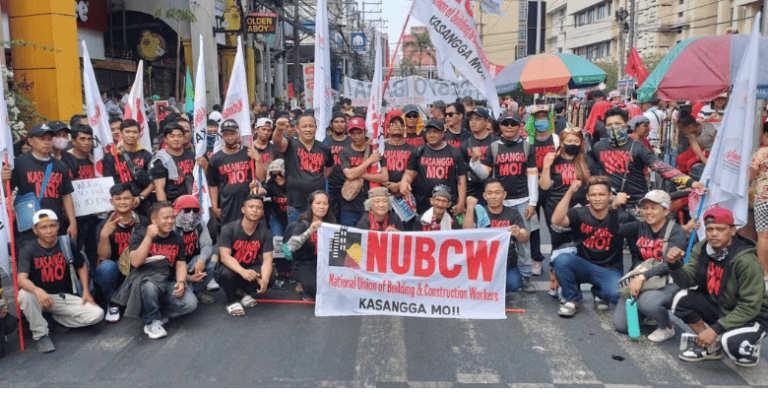 construction workers marching on May Day, The Philippines.